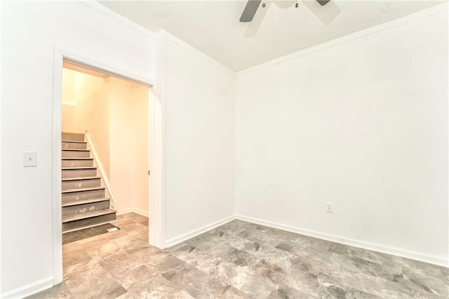 spare room featuring ceiling fan