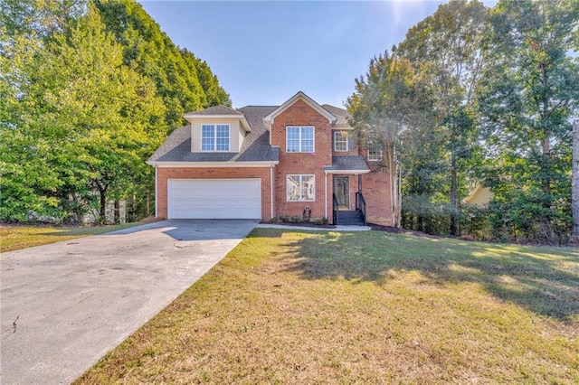 view of front of home with a garage and a front lawn