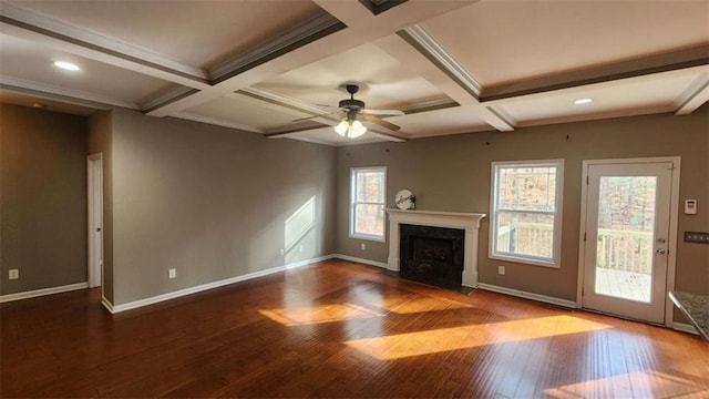 unfurnished living room featuring coffered ceiling, hardwood / wood-style flooring, beam ceiling, and ceiling fan