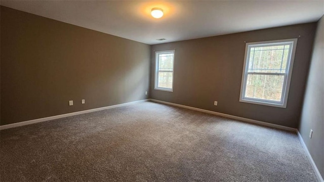 empty room with carpet floors