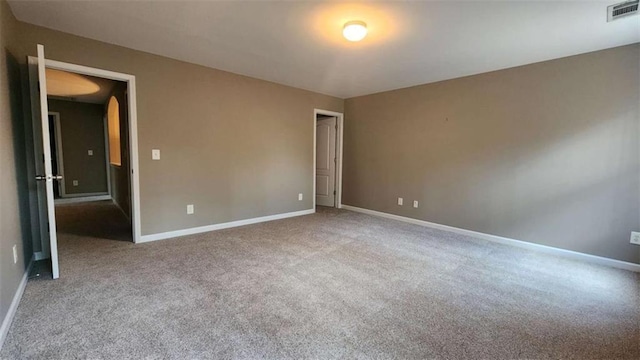 unfurnished bedroom with light carpet
