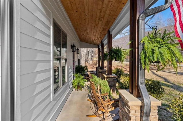 view of patio featuring a porch