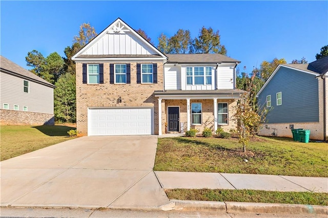 craftsman-style house with a front lawn and a garage