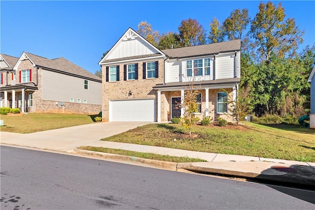 view of front facade with a front lawn and a garage