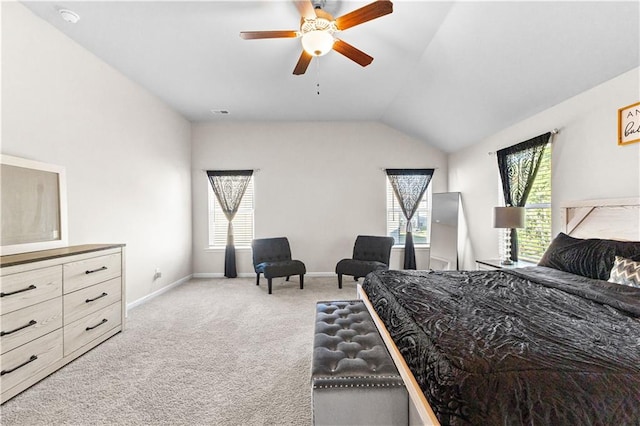 bedroom featuring light carpet, ceiling fan, and lofted ceiling