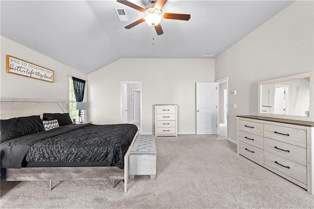 bedroom with ceiling fan, lofted ceiling, and carpet floors