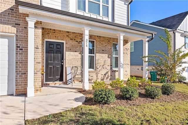 property entrance with a porch