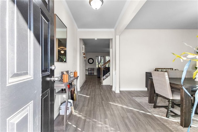 home office featuring ornamental molding and dark wood-type flooring