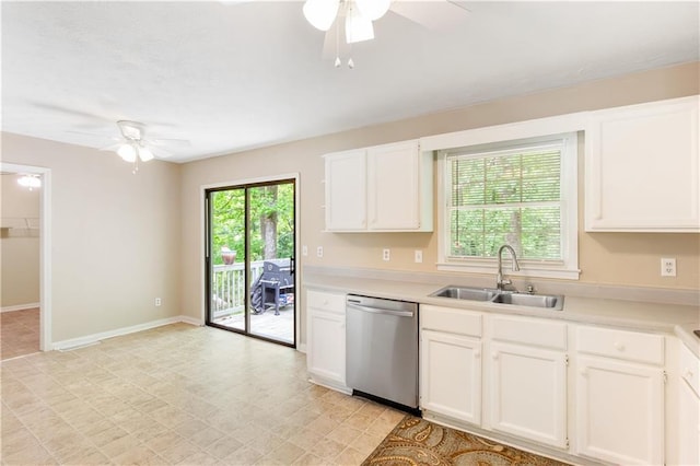 kitchen with a ceiling fan, dishwasher, a sink, light countertops, and white cabinetry