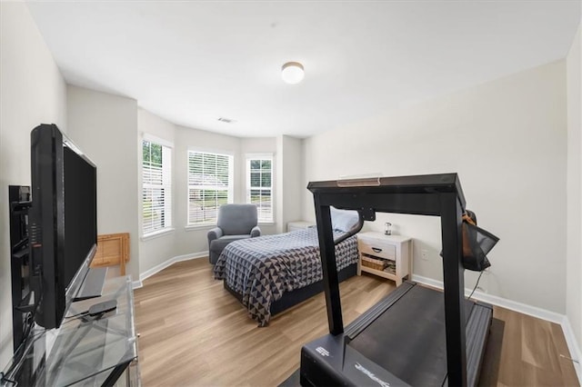5155 Scenic View Rd, Flowery Branch, GA 30542 - bedroom with wood finished floors and baseboards