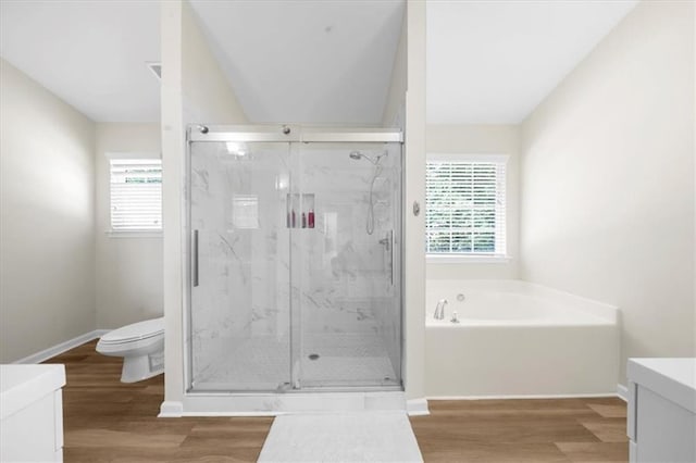 5155 Scenic View Rd, Flowery Branch, GA 30542 - full bathroom featuring wood finished floors, vanity, a bath, toilet, and a marble finish shower