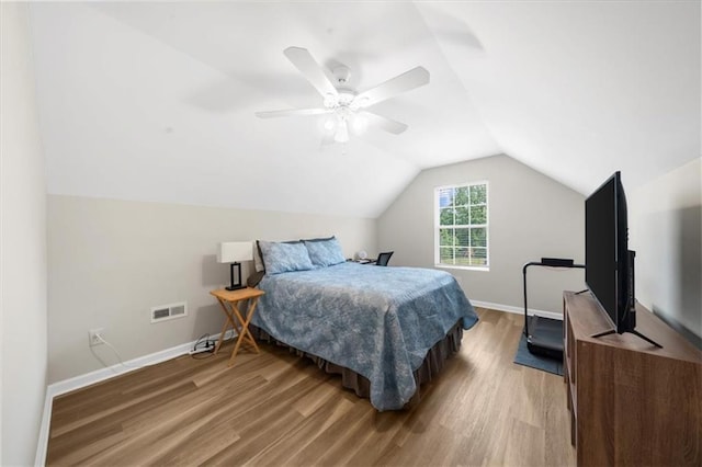 5155 Scenic View Rd, Flowery Branch, GA 30542 - bedroom featuring wood finished floors, lofted ceiling, baseboards, and a ceiling fan