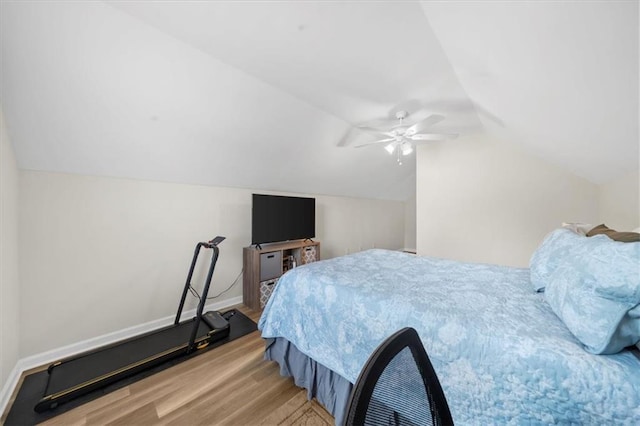 5155 Scenic View Rd, Flowery Branch, GA 30542 - bedroom with lofted ceiling, wood finished floors, and ceiling fan