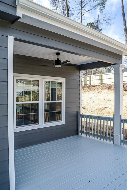 113 Miller Rd, Stockbridge, GA 30281 - wooden deck with ceiling fan