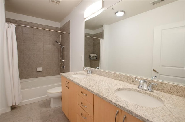 full bath with tile patterned flooring, toilet, shower / bath combination with curtain, and double vanity