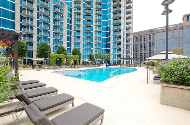 community pool with a patio