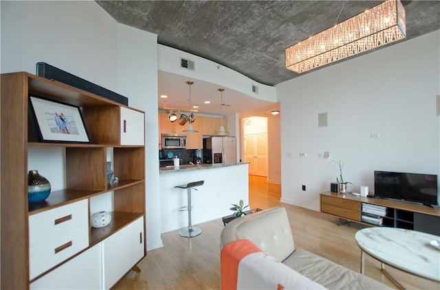 living room featuring light wood-type flooring