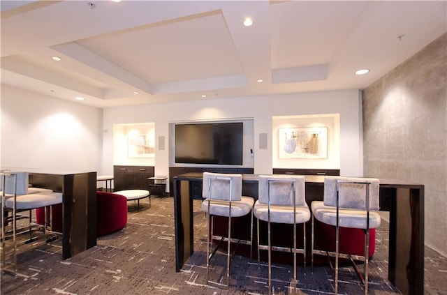 bar featuring carpet, recessed lighting, and a tray ceiling