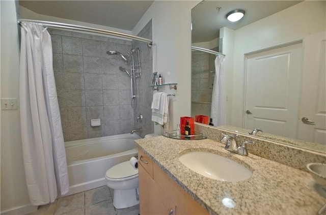 bathroom featuring tile patterned floors, shower / bath combination with curtain, toilet, and vanity