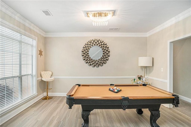 rec room with wood finished floors, visible vents, and baseboards