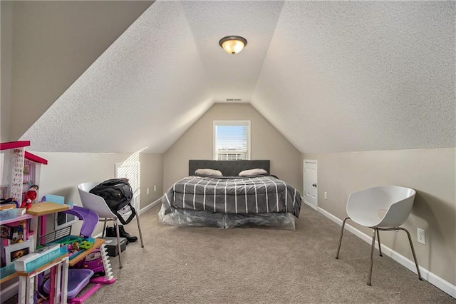 carpeted bedroom with a textured ceiling, visible vents, lofted ceiling, and baseboards