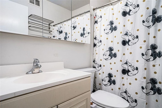 1705 Monroe Dr NE Unit E3, Atlanta, GA 30324 - bathroom featuring vanity and curtained shower