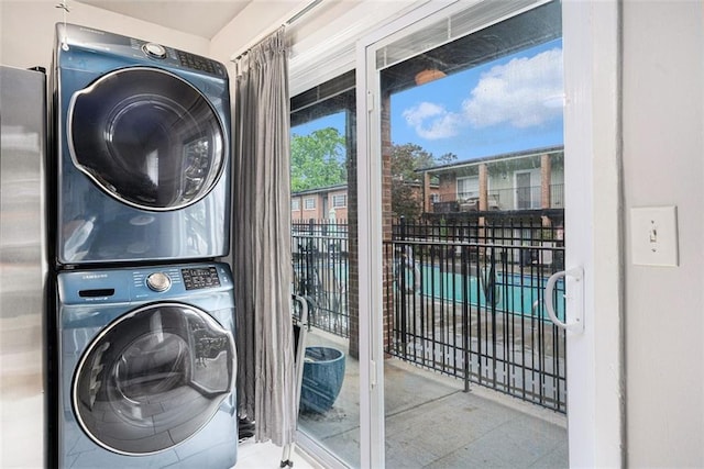 1705 Monroe Dr NE Unit E3, Atlanta, GA 30324 - laundry area featuring stacked washer / dryer