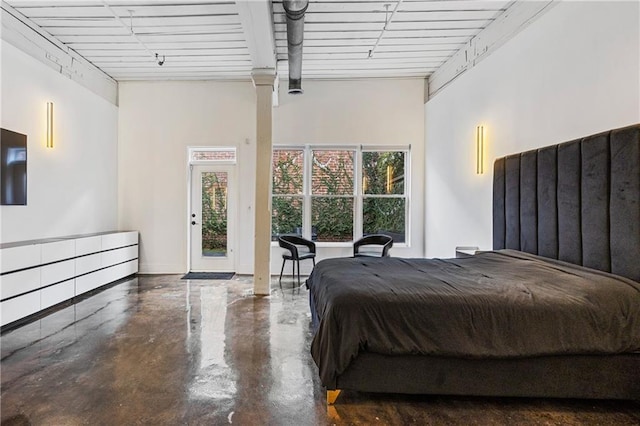 bedroom featuring multiple windows