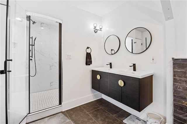 bathroom featuring tile patterned floors, vanity, and an enclosed shower