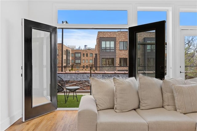 doorway with hardwood / wood-style floors