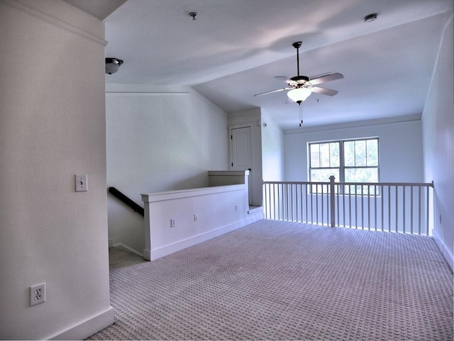 bonus room with carpet flooring, ceiling fan, and vaulted ceiling