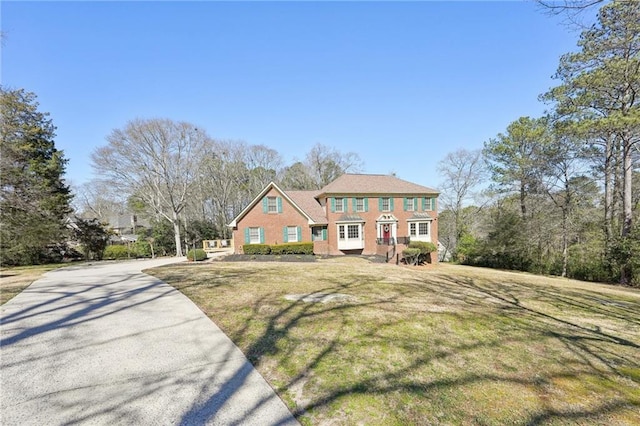 view of front of home with a front yard