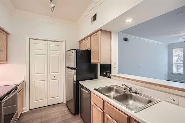 kitchen featuring light wood-type flooring, light brown cabinetry, ornamental molding, and appliances with stainless steel finishes