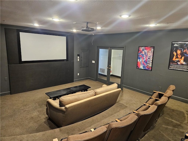 cinema room with ceiling fan, carpet floors, a textured ceiling, and french doors