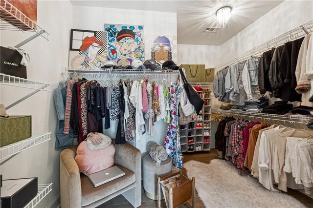 3667 Peachtree Rd NE Unit 6, Atlanta, GA 30319 - walk in closet featuring wood finished floors