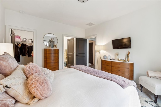 3667 Peachtree Rd NE Unit 6, Atlanta, GA 30319 - bedroom with a spacious closet, carpet, and a closet