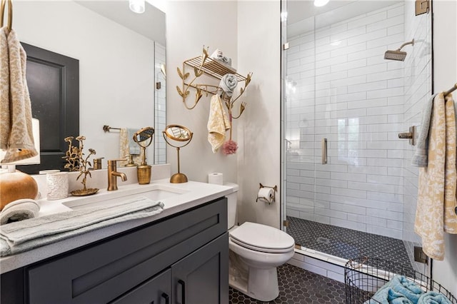 3667 Peachtree Rd NE Unit 6, Atlanta, GA 30319 - bathroom with toilet, a shower stall, vanity, and tile patterned floors