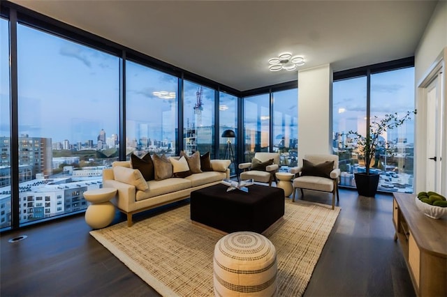 sunroom / solarium featuring a view of city and plenty of natural light