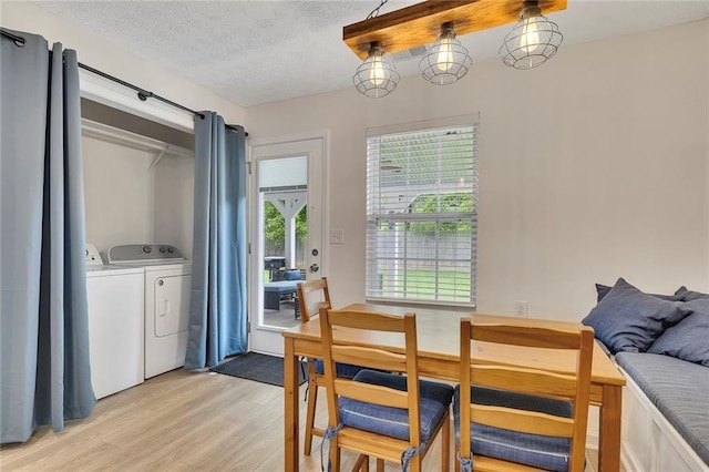 15 Echota Rd NE, Cartersville, GA 30121 - dining area featuring washer and clothes dryer, light wood finished floors, and a textured ceiling
