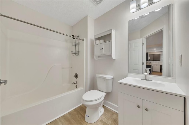 15 Echota Rd NE, Cartersville, GA 30121 - bathroom featuring wood finished floors, vanity, and washtub / shower combination