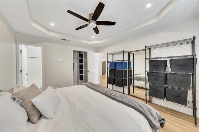 15 Echota Rd NE, Cartersville, GA 30121 - bedroom featuring wood finished floors, a tray ceiling, recessed lighting, a ceiling fan, and ensuite bathroom