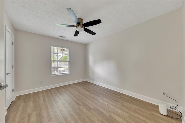 15 Echota Rd NE, Cartersville, GA 30121 - empty room with light wood finished floors, a textured ceiling, and ceiling fan