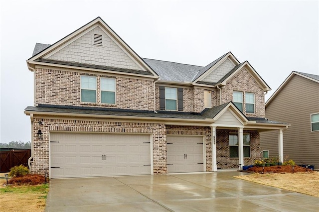 view of front facade featuring concrete driveway, brick siding, and an attached garage