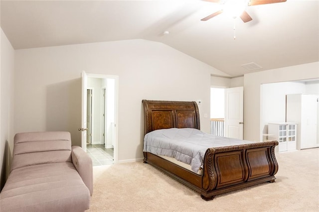 bedroom with lofted ceiling, ceiling fan, baseboards, and light colored carpet