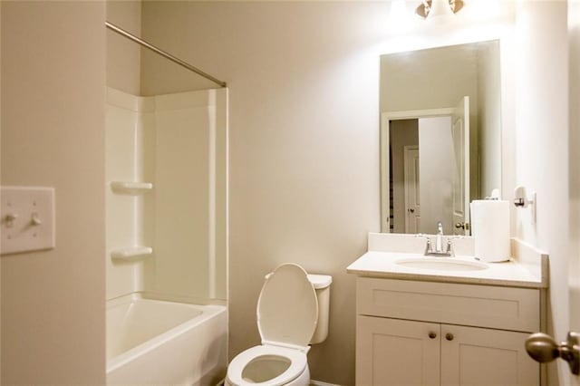 full bathroom featuring vanity, toilet, and shower / bathtub combination