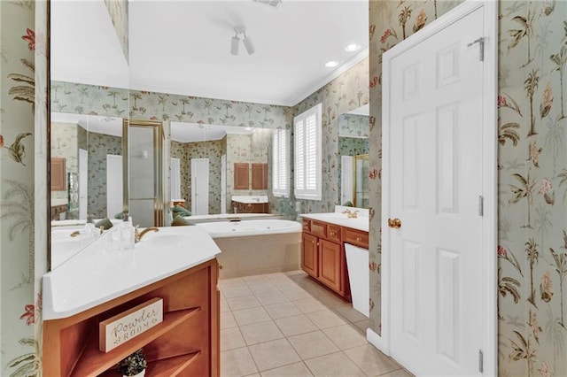 bathroom with wallpapered walls, a shower stall, tile patterned flooring, two vanities, and a garden tub