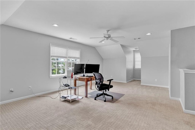 home office featuring light colored carpet, lofted ceiling, a ceiling fan, baseboards, and recessed lighting