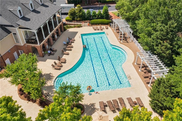community pool with a patio