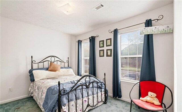 4014 Ivy Trace Ln, Ellenwood, GA 30294 - bedroom featuring carpet floors, baseboards, and visible vents