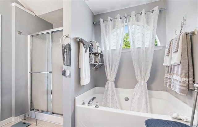 4014 Ivy Trace Ln, Ellenwood, GA 30294 - bathroom with curtained shower and a bath